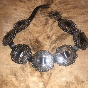 Black leather belt with silver cross conchos
